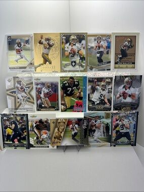 Drew Brees Saints lot of 15 w/ McAllister/Horn/Olave/Irv Smith Gold Medallion